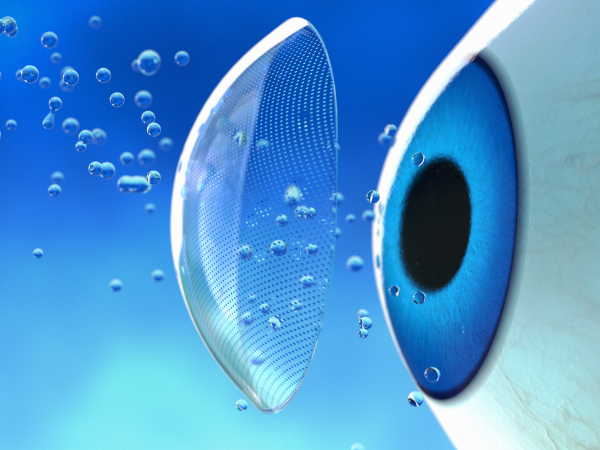 Lentes de contato futuristas permitem que humanos enxerguem no infravermelho Imagem que retrata um olho humano e lente de contato